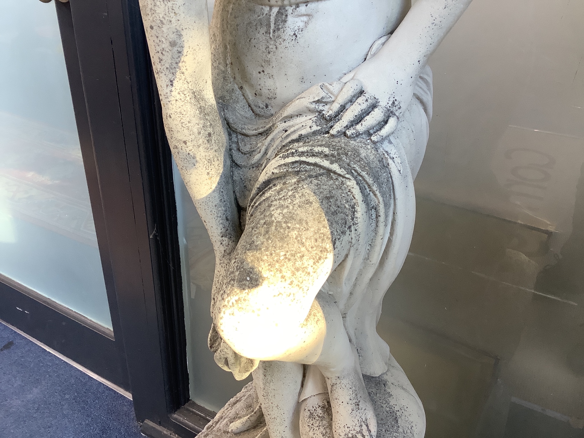 A 19th century carved marble statue of Venus, raised on a reconstituted plinth, height 135cm